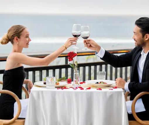 Couple enjoying romantic dinner at Canna Bali beachfront