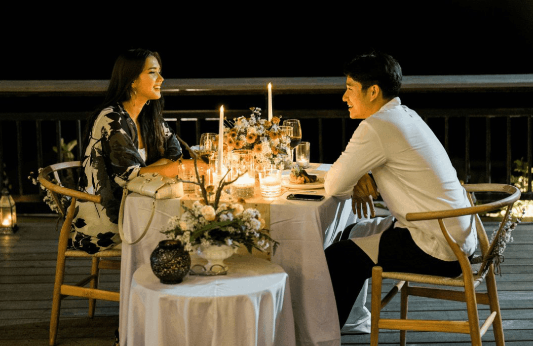 Private romantic dinner setup at Canna Bali beachfront with ocean view